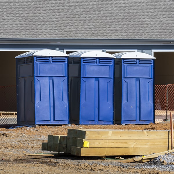 what is the cost difference between standard and deluxe portable toilet rentals in Rodney